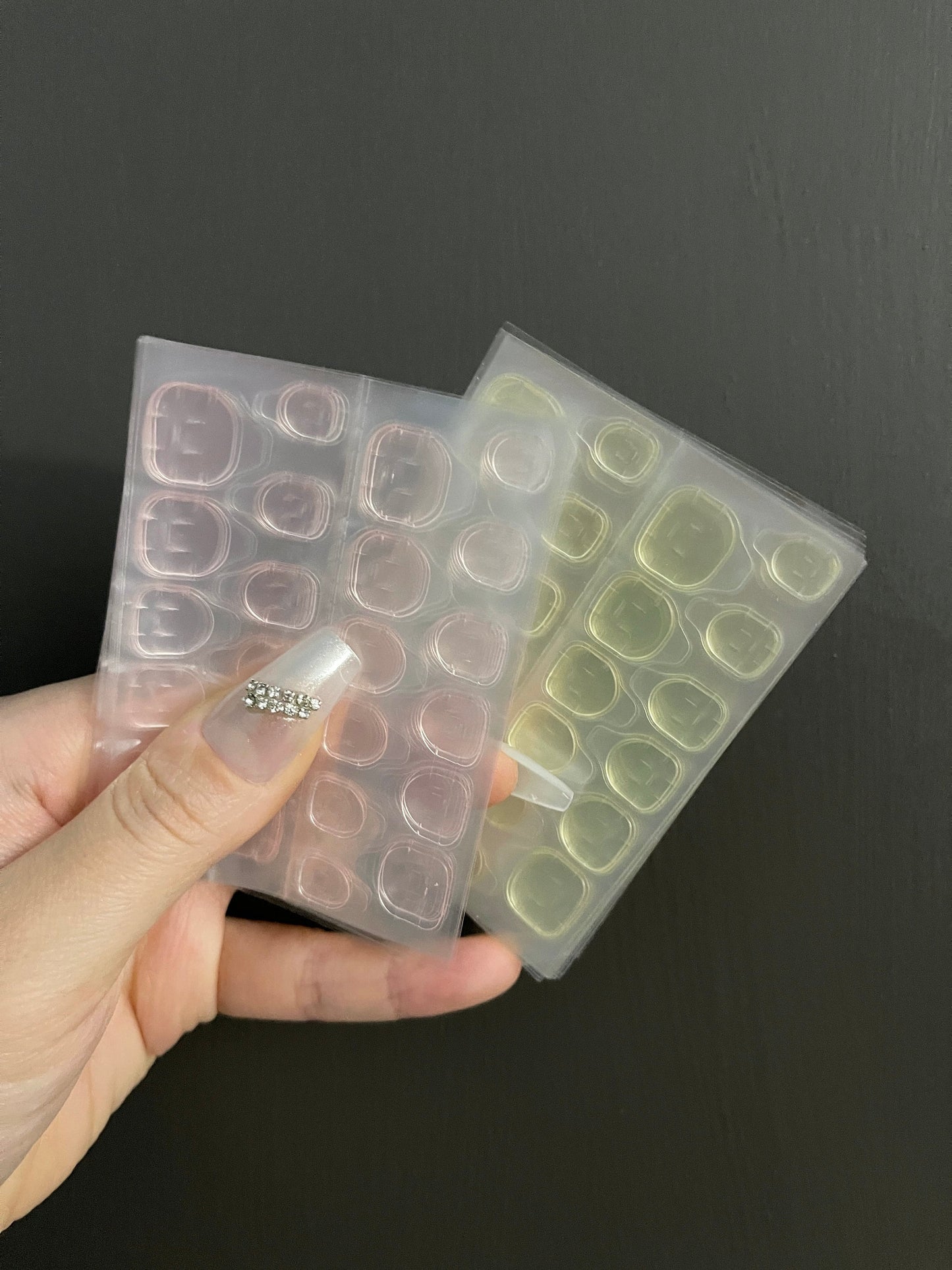 Super Strong Adhesive Tabs for Press On Nails, 1 Sheet 24 Tabs, Double Sided Nail Stickers, Available in Pink and Yellow.