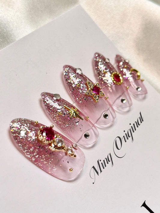 Sailor moon pink ombre glitter press on nail, pink gemstone with gold charm Fake nails, star and moon shape nail, Rhinestone andmade Gel Nai