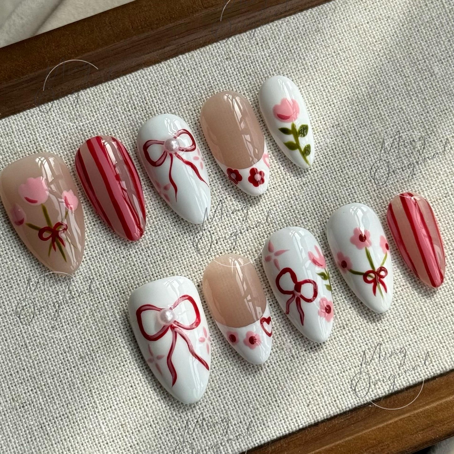 Sweet Tulip Garden | Floral press on nails, red bow nail art, pink flower designs, hand-painted, white and nude mix, gift for her, MO487