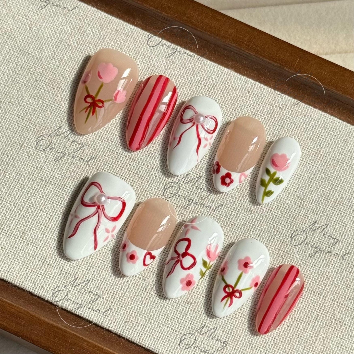 Sweet Tulip Garden | Floral press on nails, red bow nail art, pink flower designs, hand-painted, white and nude mix, gift for her, MO487