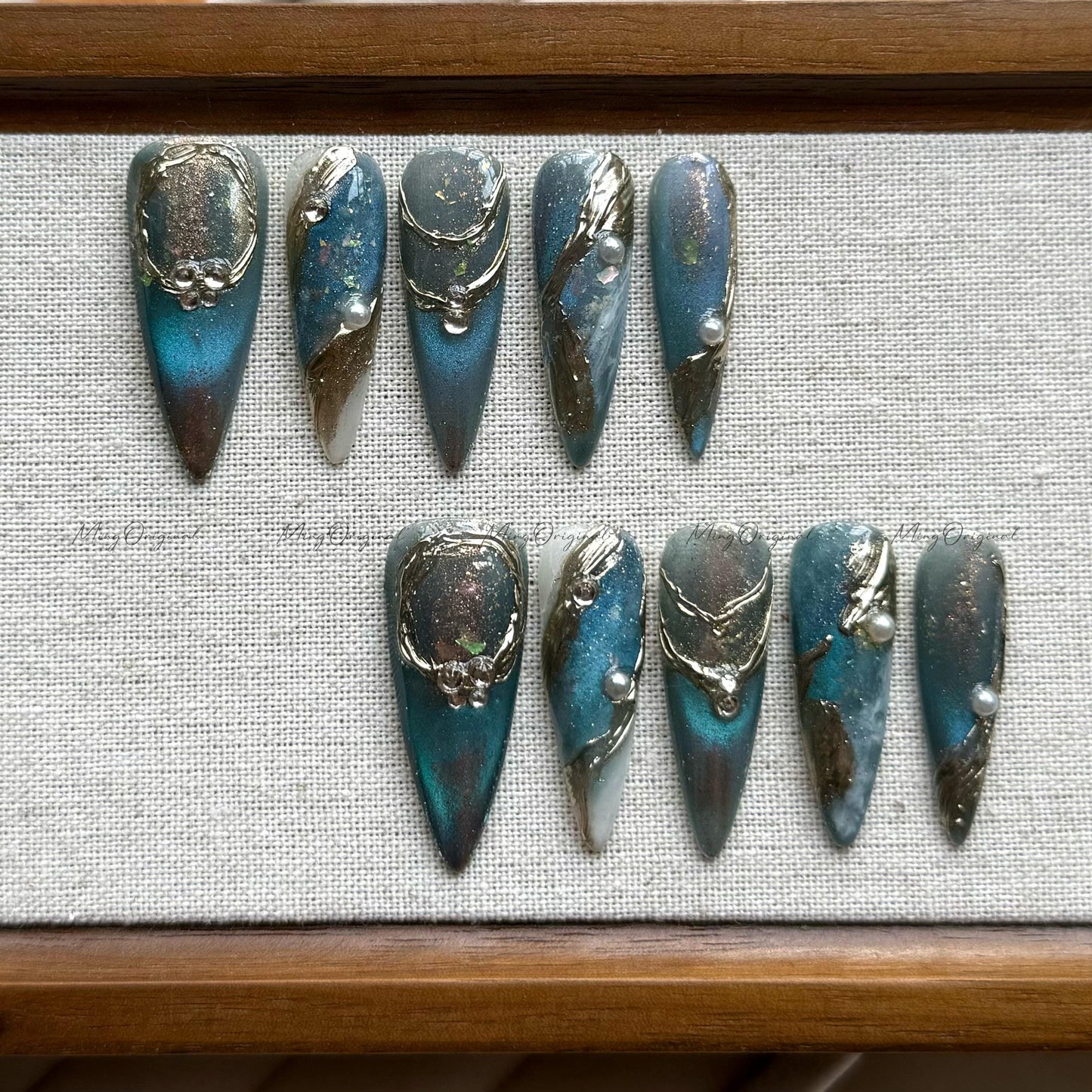 Midnight Tide cat eye color shifting mystery galaxy press on nails, gold chrome accents, cosmic shimmer design,deep universe aesthetic,MO521