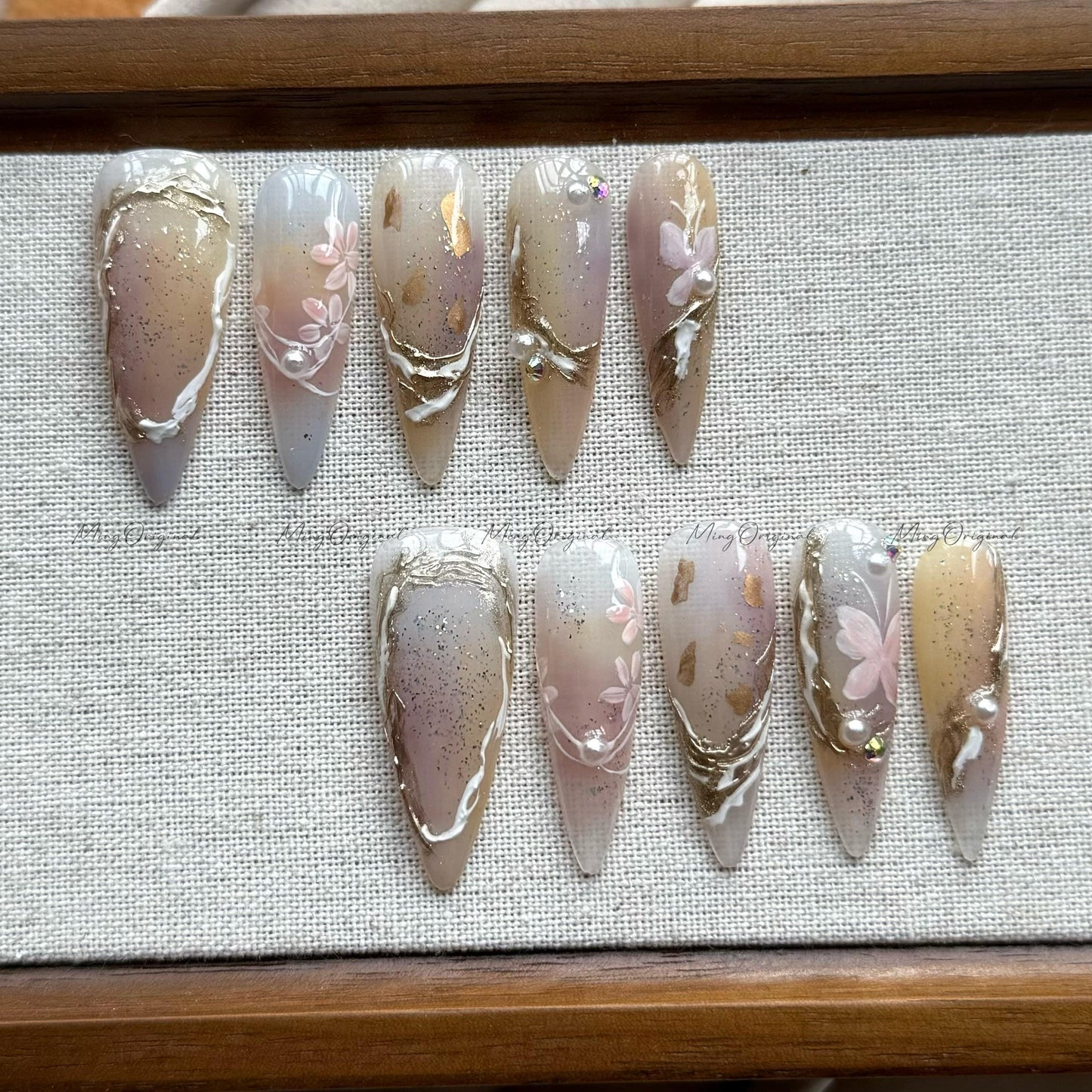 Fairy Bloom floral shimmer press on nails, hand-painted butterfly white flowers soft neutral nails, gold foil accents ethereal design MO518
