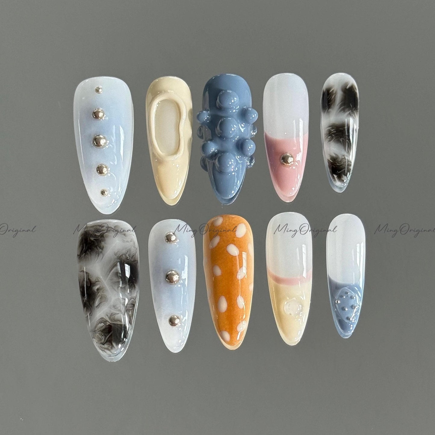 Soft Pastel and Smoke Mixed Press on Nails, blue beige pink, 3D texture, smoky marble, silver studs, sika deer pattern, MO676