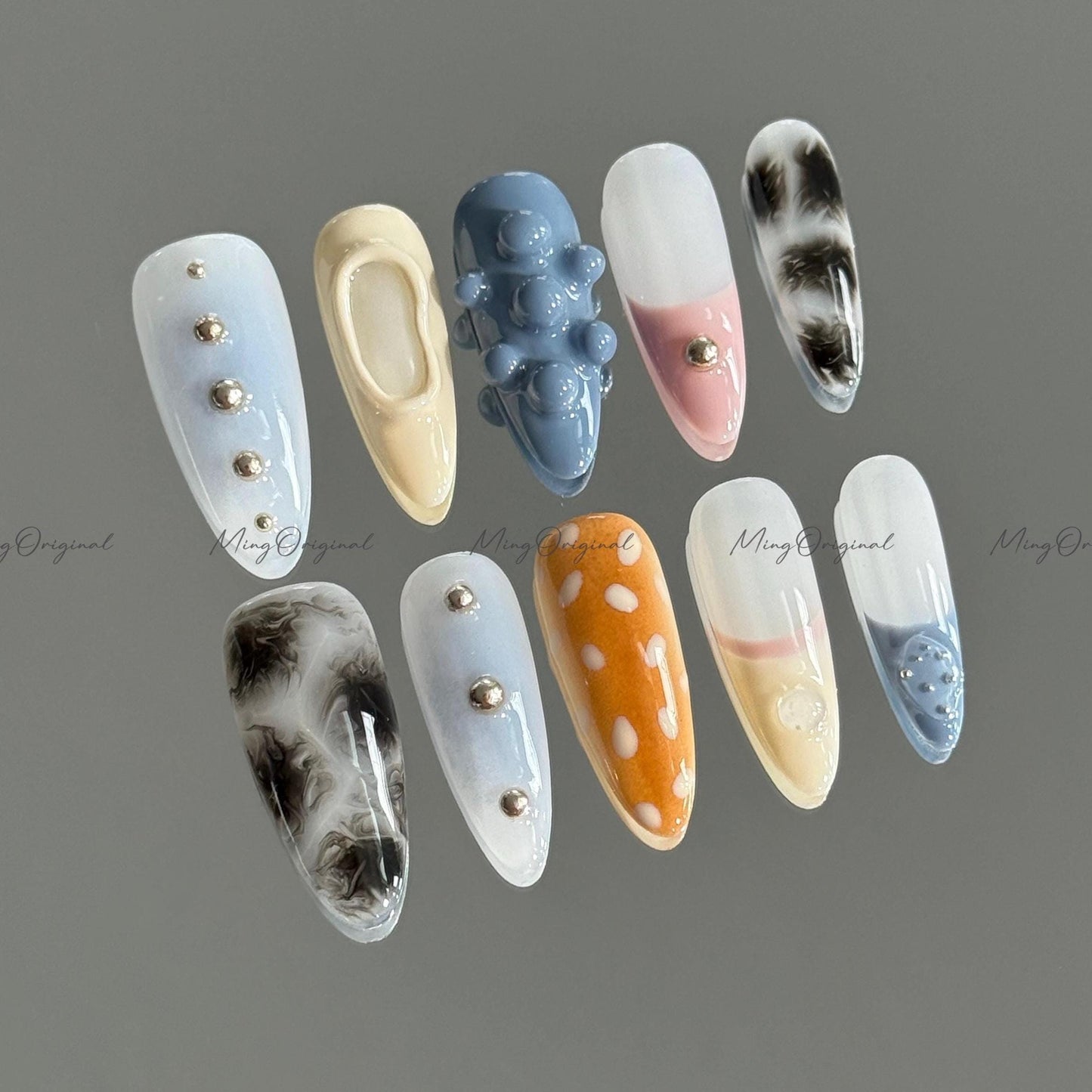 Soft Pastel and Smoke Mixed Press on Nails, blue beige pink, 3D texture, smoky marble, silver studs, sika deer pattern, MO676
